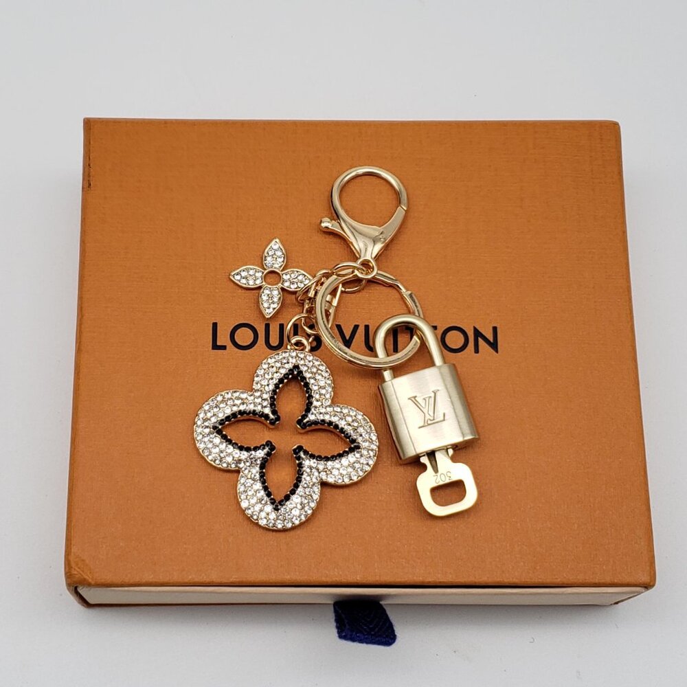 Authentic Louis Vuitton Gold Lock & Box w/ Unbranded Clover Bagcharm